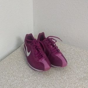 Nike Purple And White Shoes.